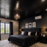 Modern bedroom with a dark charcoal accent wall, black bedding, and slatted ceiling.